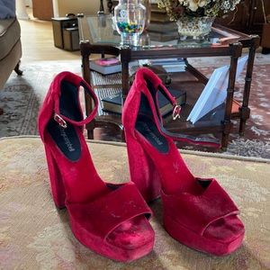 Worn Jeffrey Campbell red heels
